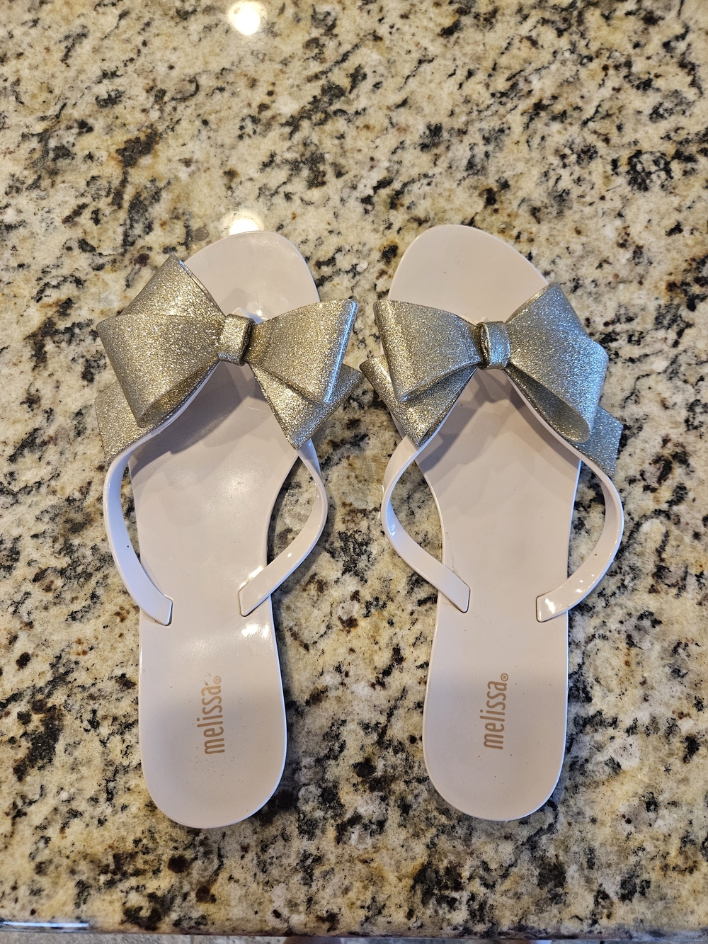 Melissa Women’s Glitter Bow Slide Sandals in Gold and Light Pink